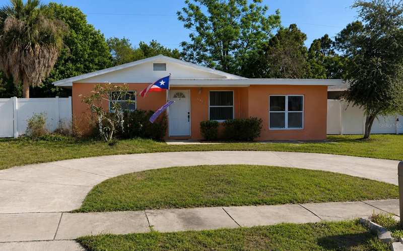 4 bedroom Single Family Residence at 7507 W Caracas Street, Holliday Village Sec 1, Tampa — photo 1