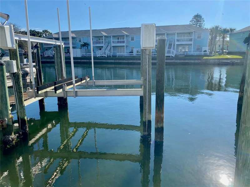 bedroom Dock-Rackominium at 0 Starfish Drive #0, Waterside At Coquina Key Dock Condo, St Petersburg — photo 1