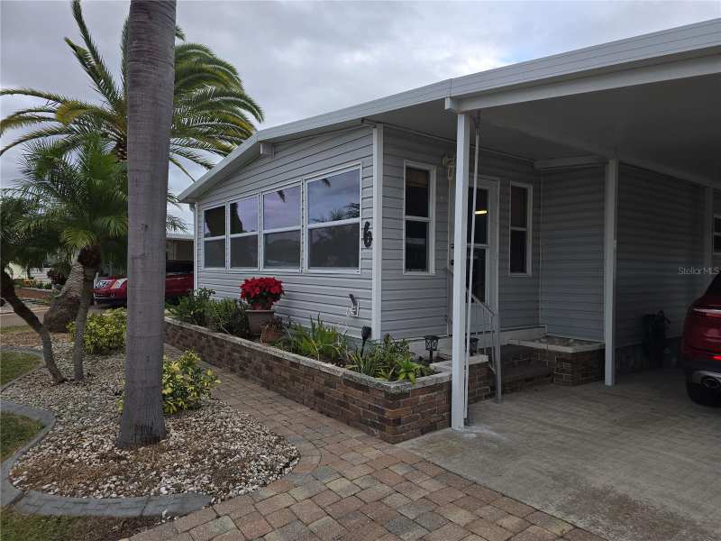 2 bedroom Manufactured Home at 6 S Botany Bay Circle, Polynesian Village, Englewood — photo 1