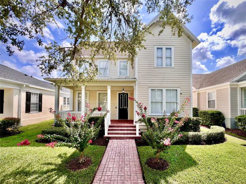 5 bedroom Single Family Residence at 205 N Village Street, Celebration North Village Unit 6, Celebration — photo 1