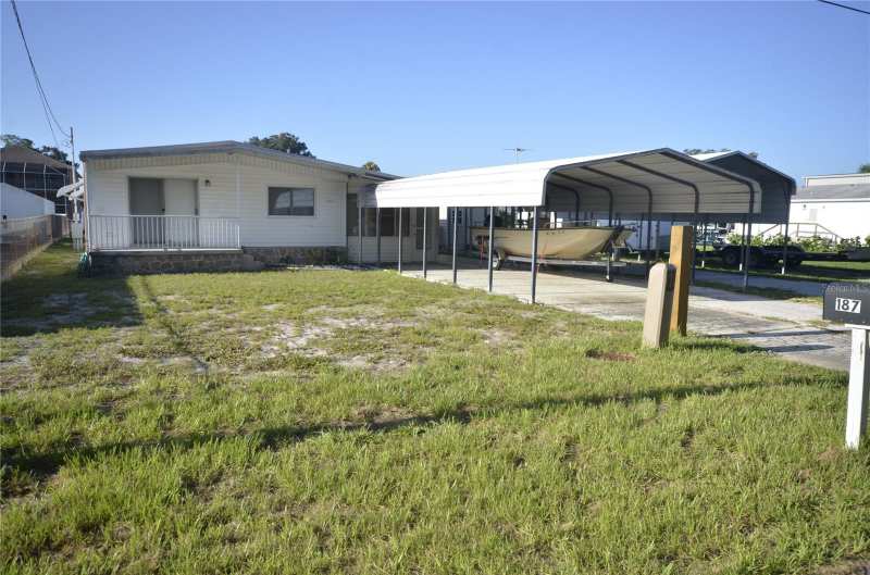4 bedroom Manufactured Home at 187 E Ariel Road, Indian Harbor Estates Unit 03, Oak Hill — photo 1