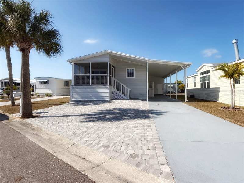2 bedroom Manufactured Home at 124 E Saint Annes Circle, Caribbean Isles Residential Cooperative, Apollo Beach — photo 1