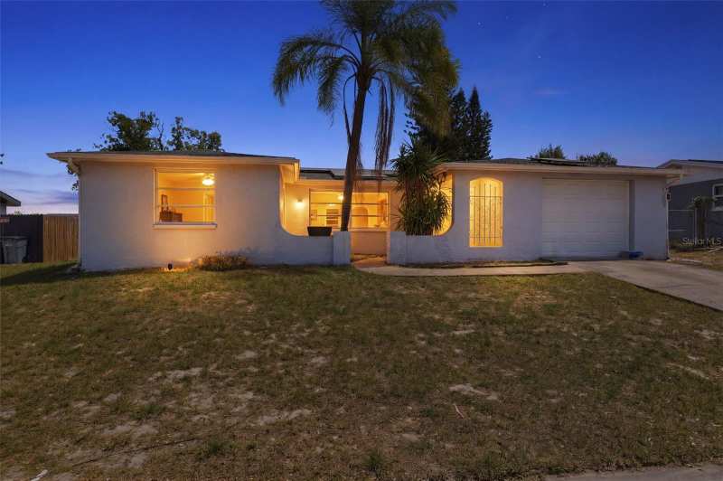 3 bedroom Single Family Residence at 9720 Rainbow Lane, Regency Park, Port Richey — photo 1