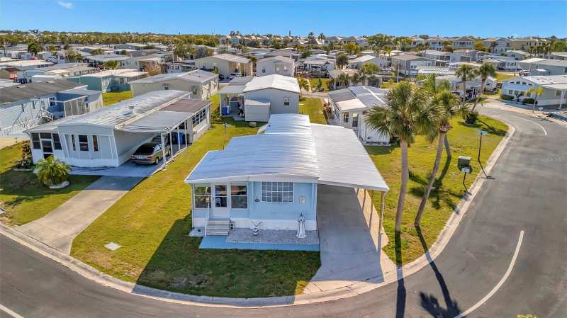 2 bedroom Mobile Home at 128 E Saint Johns Way, Caribbean Isles Residential Co, Apollo Beach — photo 1