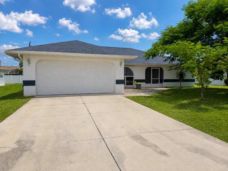 3 bedroom Single Family Residence at 64 Norman Street, Port Charlotte Sec 015, Port Charlotte — photo 1