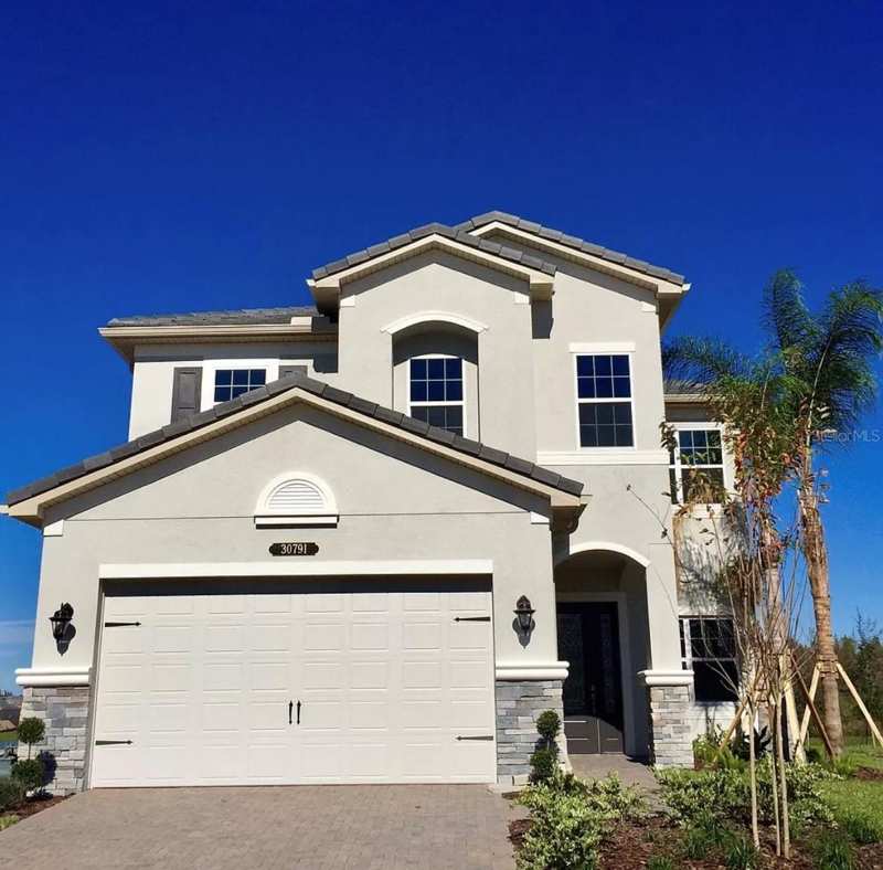 5 bedroom Single Family Residence at 30791 Lindentree Drive, Wiregrass M23 Ph 3, Wesley Chapel — photo 1