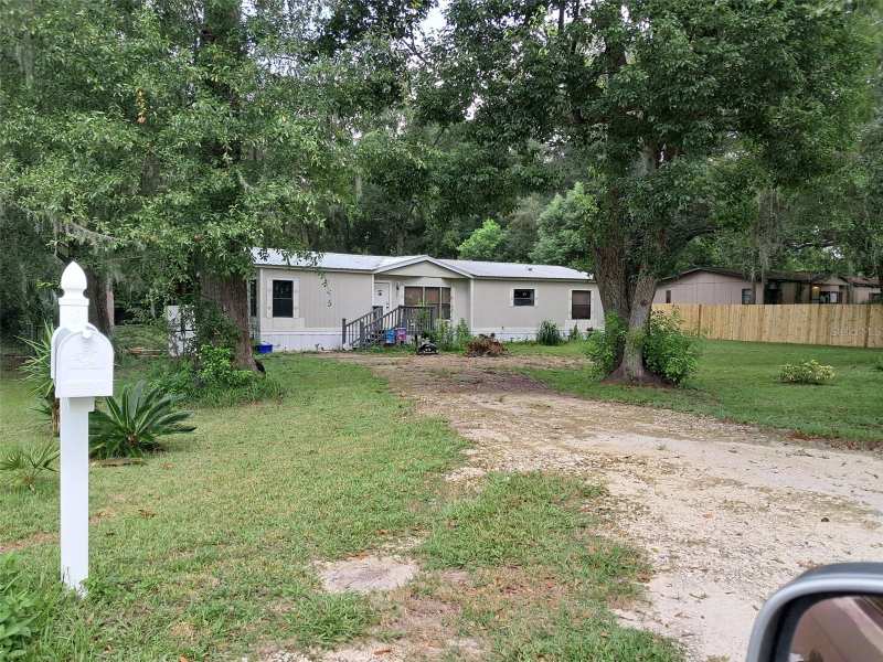 3 bedroom Manufactured Home at 14902 NE 142nd Street, Brannings 2nd Add To Waldo, Waldo — photo 1