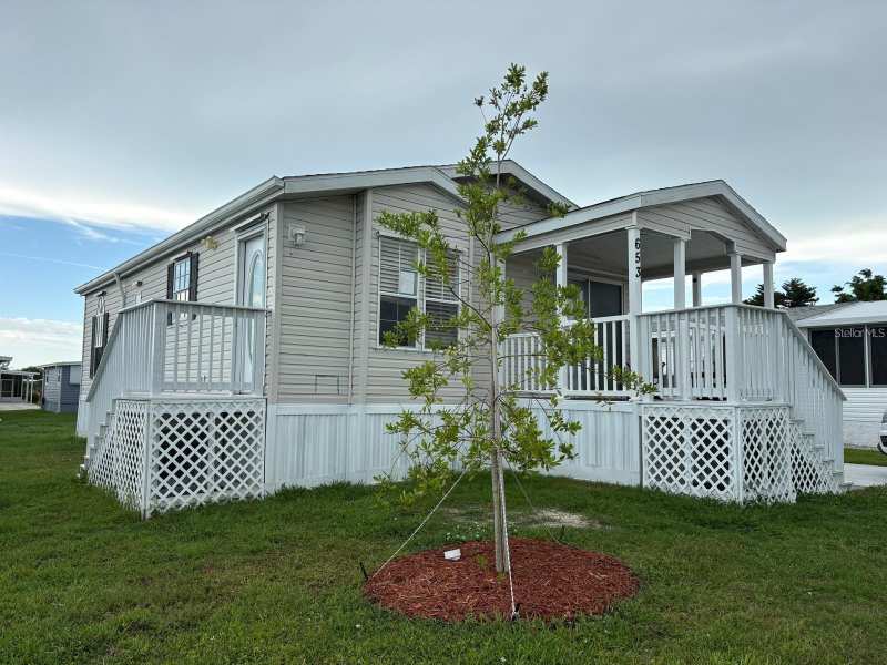 2 bedroom Manufactured Home at 653 Los Altos, La Casa Mhp Co-Op, North Port — photo 1