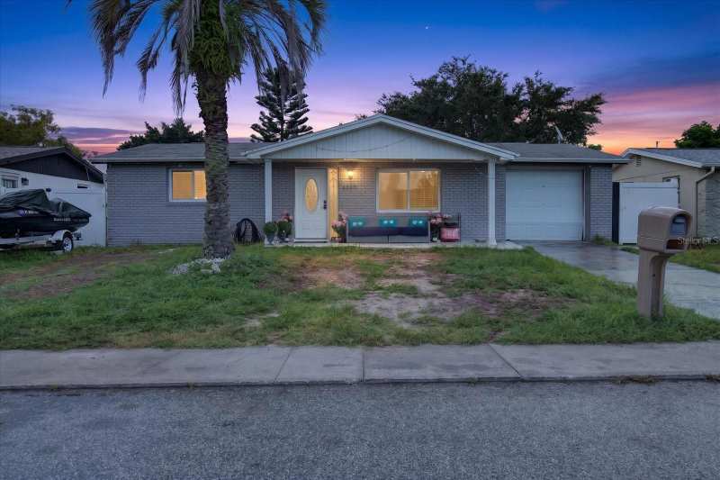 3 bedroom Single Family Residence at 9440 Rainbow Lane, Regency Park, Port Richey — photo 1