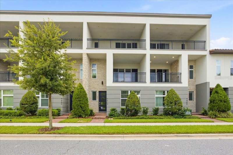 4 bedroom Townhouse at 9874 Bucklow Hill Drive, Eagle Creek Village K Phase 1B, Orlando — photo 1