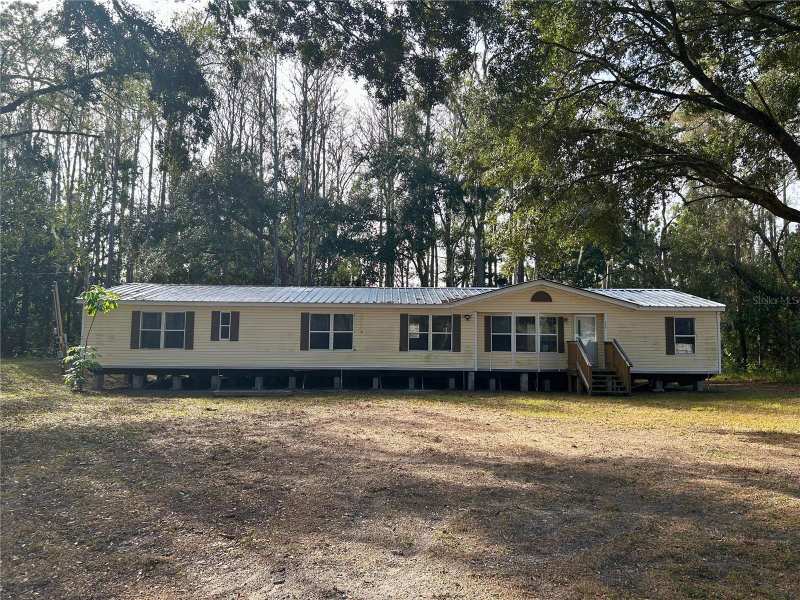 4 bedroom Manufactured Home at 9867 Jerome Drive, Moon Lake Estates, New Port Richey — photo 1