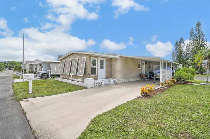 2 bedroom Manufactured Home at 145 Edgewood Drive, Arbors, Osprey — photo 1