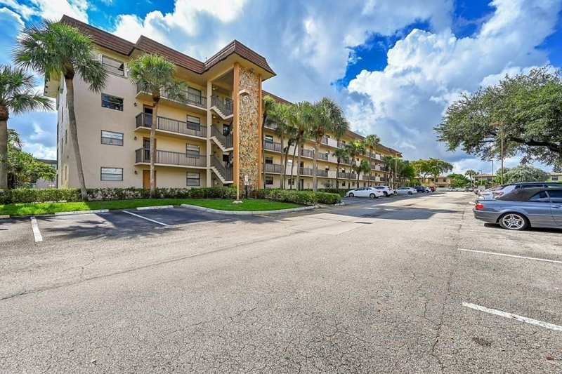 2 bedroom Condominium at 6095 N Sabal Palm Boulevard #212, Lakes Of Carriage Hills, Tamarac — photo 1
