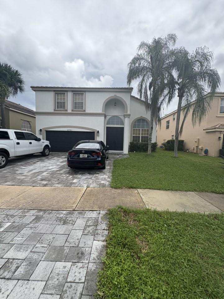 4 bedroom Single Family Residence at 2761 Misty Oaks Circle, Madison Green 01, Royal Palm Beach — photo 1