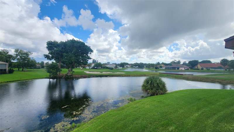 3 bedroom Condominium at 8751 Holly Court #202, Holly Court At Woodmont, Tamarac — photo 1