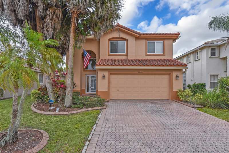 4 bedroom Single Family Residence at 5049 NW 121st Drive, Wyndham Lakes Central, Coral Springs — photo 1