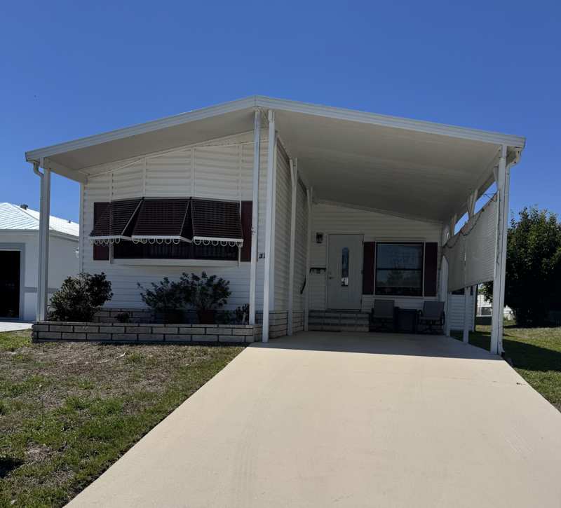 2 bedroom Manufactured Home at 37 San Roberto, Spanish Lakes Country Club Village, Fort Pierce — photo 1