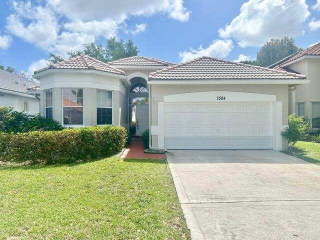 4 bedroom Single Family Residence at 7584 Thornlee Drive, Lake Charleston Tr X, Greenacres — photo 1