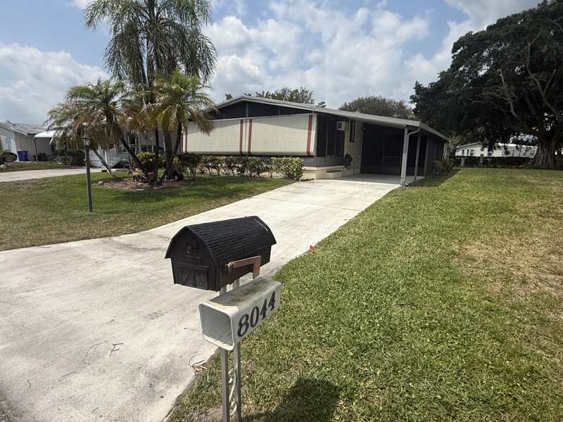 2 bedroom Manufactured Home at 8044 SE Patriot Avenue, Cambridge At Heritage Ridge, Hobe Sound — photo 1