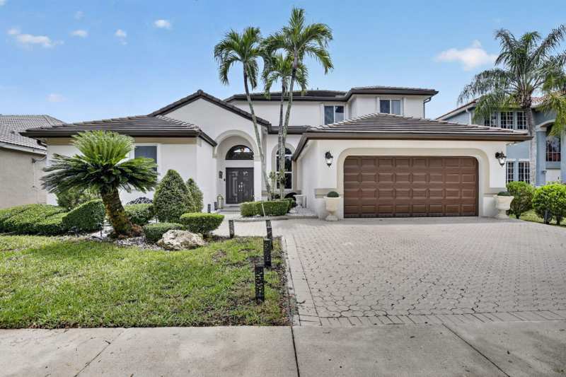 5 bedroom Single Family Residence at 711 Heritage Way, Sector 4 North, Weston — photo 1