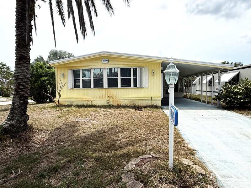 2 bedroom Manufactured Home at 7089 SE Bluebird Circle, Ridgeway, Hobe Sound — photo 1