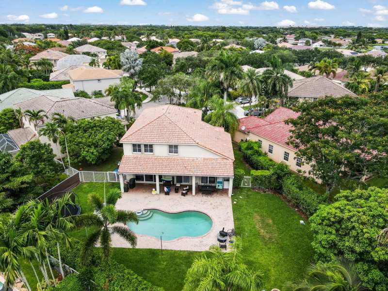 5 bedroom Single Family Residence at 4411 Stone Ridge Way, Sectors 9 And 10-Parcel H, Weston — photo 1