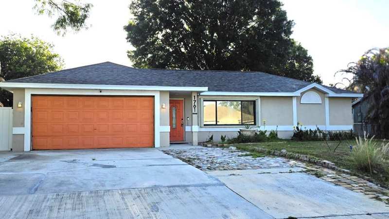 4 bedroom Single Family Residence at 1761 SW Monterrey Lane, Port St Lucie Section 9, Port St. Lucie — photo 1