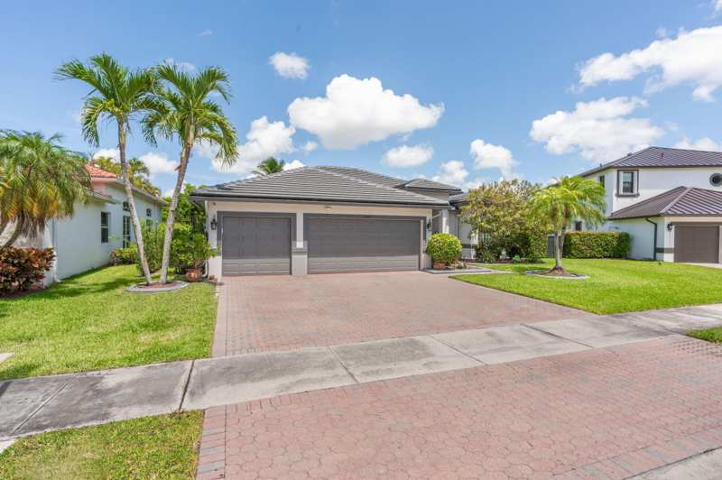 5 bedroom Single Family Residence at 5617 NW 106th Way, Kensington North, Coral Springs — photo 1