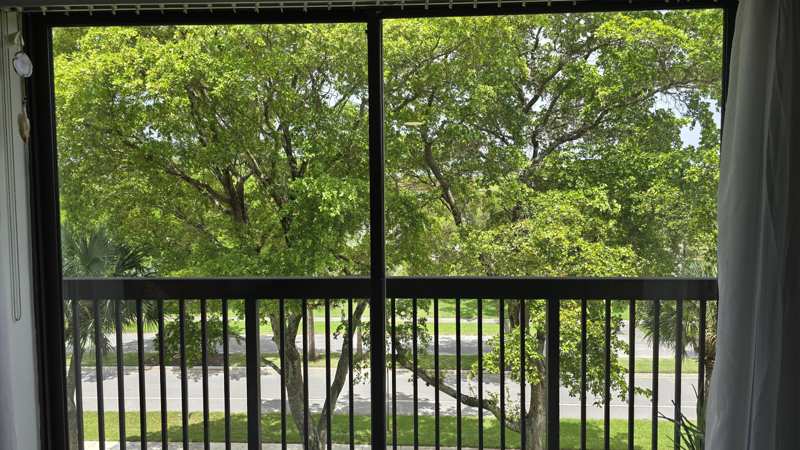 2 bedroom Condominium at 4965 E Sabal Palm Boulevard #403, Lakes Of Carriage Hills, Tamarac — photo 1