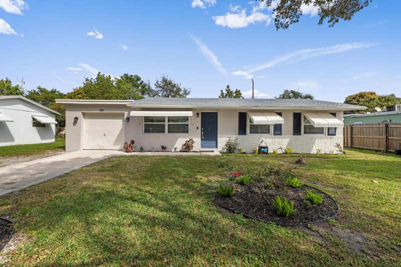 4 bedroom Single Family Residence at 336 S Chillingworth Drive, Palm Beach Lakes South, West Palm Beach — photo 1