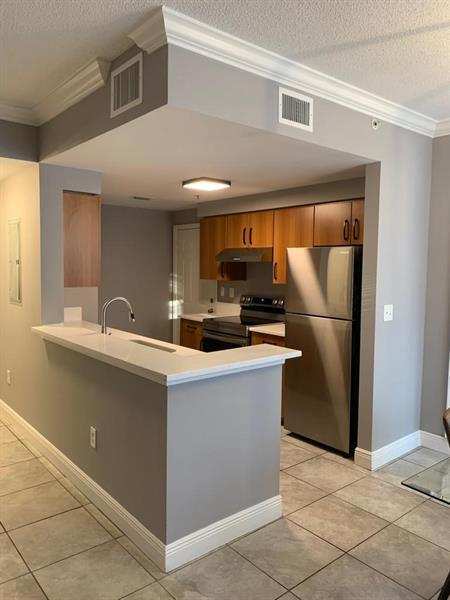 2 bedroom Condominium at 6020 W Sample Road #105, El-Ad Poinciana Condo, Coral Springs — photo 1