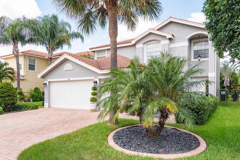 5 bedroom Single Family Residence at 5013 Cobalt Court, Nautica Isles West 1, Greenacres — photo 1