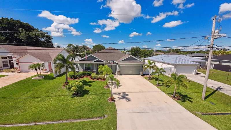4 bedroom Single Family Residence at 343 SE Fisk Road, Port St Lucie Section 39, Port St. Lucie — photo 1