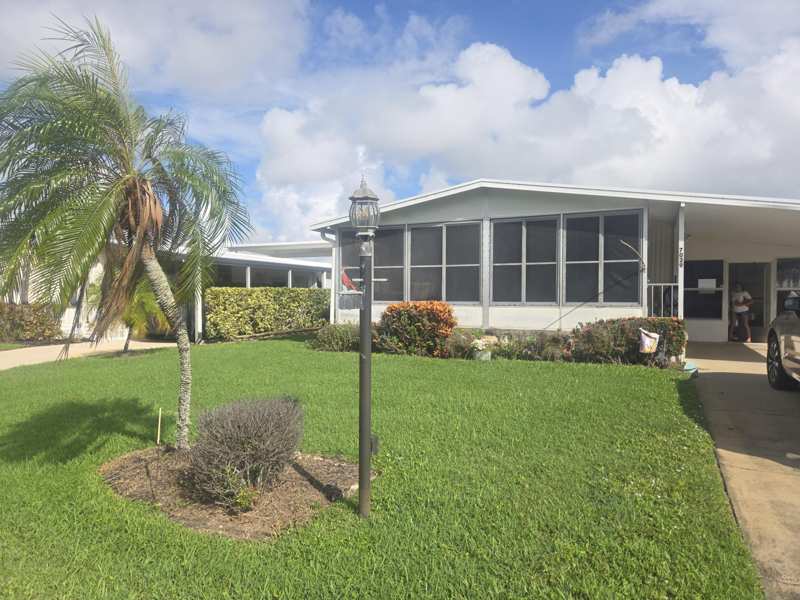 2 bedroom Mobile Home at 7029 SE Congress Street, Cambridge At Heritage Ridge, Hobe Sound — photo 1