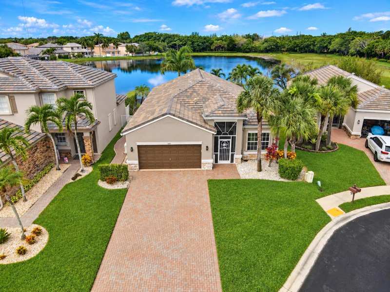4 bedroom Single Family Residence at 5691 Saddle Trail Lane, Thoroughbred Lake Estates 1, Lake Worth — photo 1