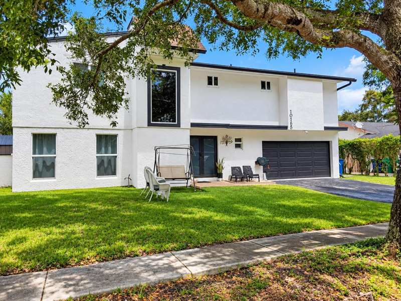 4 bedroom Single Family Residence at 10165 SW 53rd Street, Guardian Estates, Cooper City — photo 1