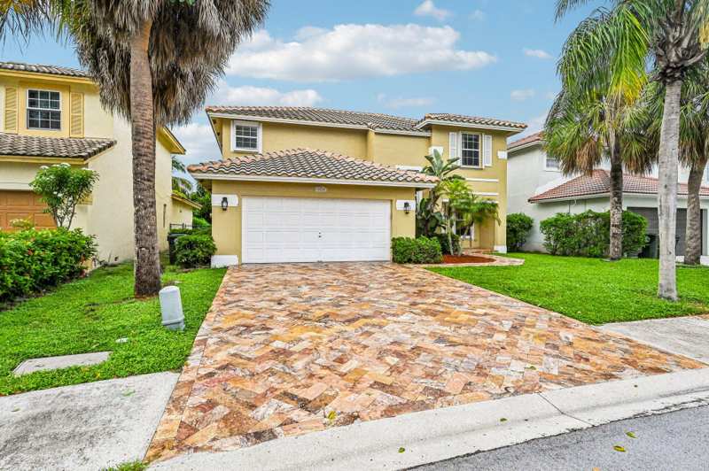 4 bedroom Single Family Residence at 6520 NW 41st Terrace, Cocobay, Coconut Creek — photo 1