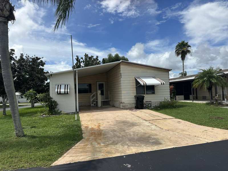 2 bedroom Manufactured Home at 5591 Hemingway Court #E-01, Tropical Isles, Fort Pierce — photo 1