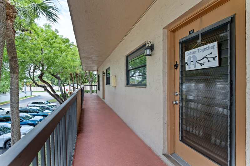 2 bedroom Condominium at 6095 N Sabal Palm Boulevard #207, Lakes Of Carriage Hills, Tamarac — photo 1
