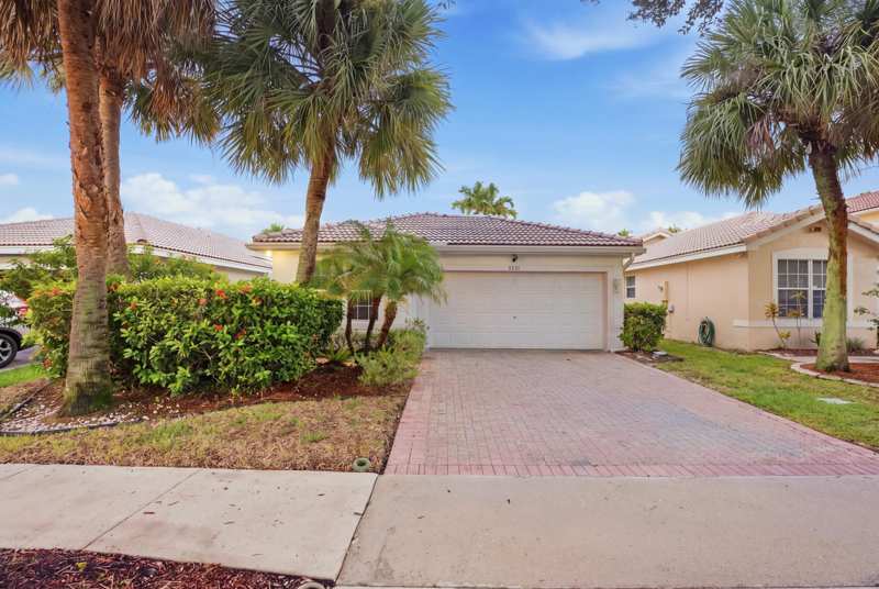 3 bedroom Single Family Residence at 5231 NW 117th Avenue, Wyndham Lakes, Coral Springs — photo 1