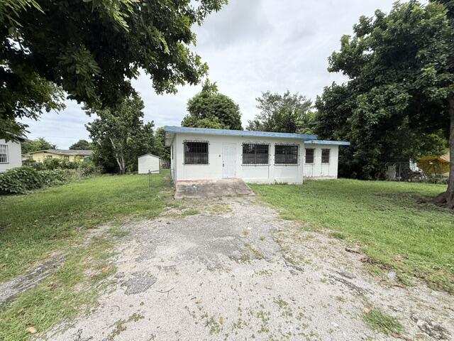 4 bedroom Single Family Residence at 1421 NW Avenue D, Sylda Heights Belle Glade, Belle Glade — photo 1