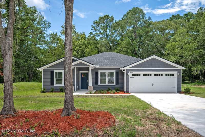 4 bedroom Single Family Residence at 15680 Butch Baine Drive, Section Land, Jacksonville — photo 1