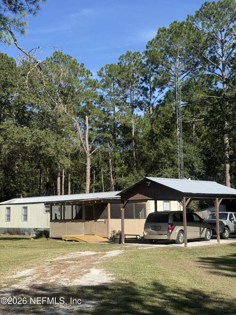 2 bedroom Mobile Home at 20399 County Road 235, Metes & Bounds, Brooker — photo 1