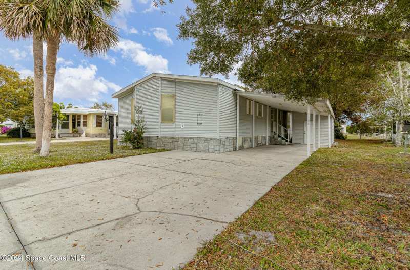 2 bedroom Manufactured Home at 1108 Indigo Drive, Barefoot Bay Unit 2 Part 11, Barefoot Bay — photo 1