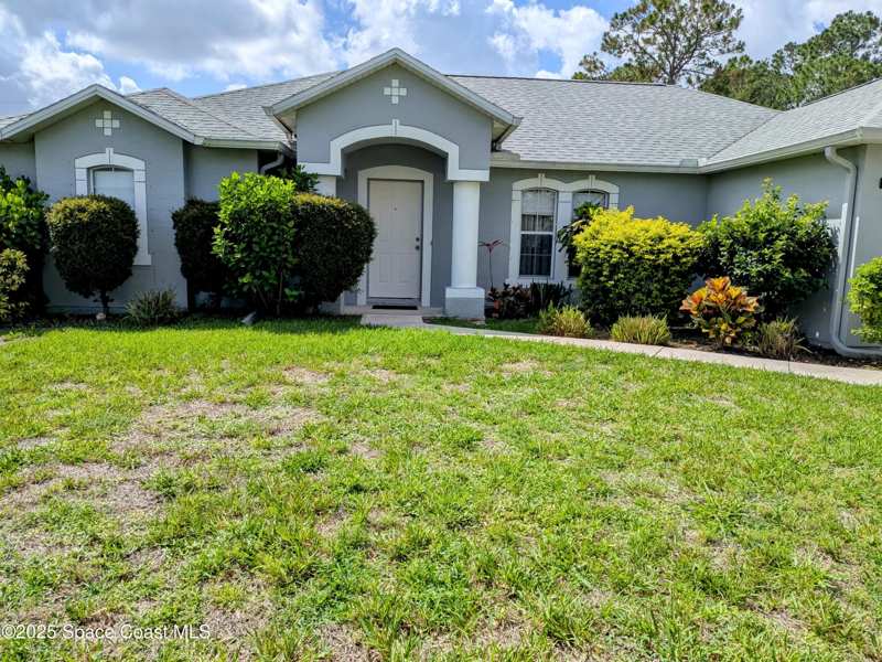 3 bedroom Single Family Residence at 872 Ravenswood Street, Port Malabar Unit 22, Palm Bay — photo 1