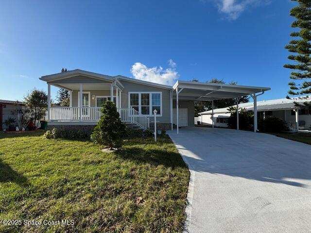3 bedroom Manufactured Home at 723 Hyacinth Circle, Barefoot Bay Unit 2 Part 10, Barefoot Bay — photo 1