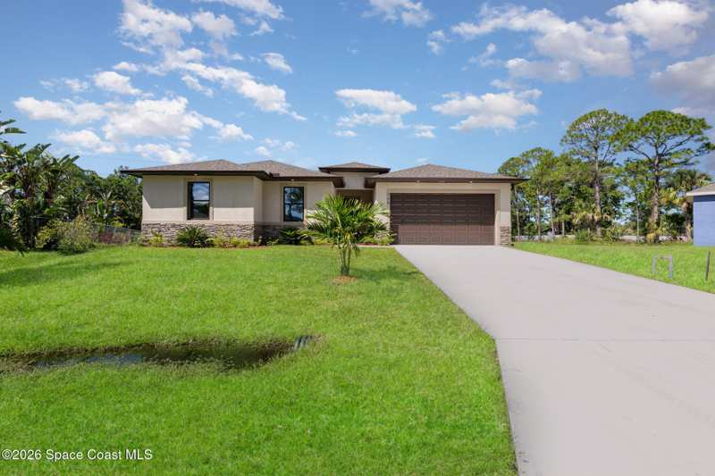 4 bedroom Single Family Residence at 1049 Towhlen Street, Port Malabar Unit 23, Palm Bay — photo 1