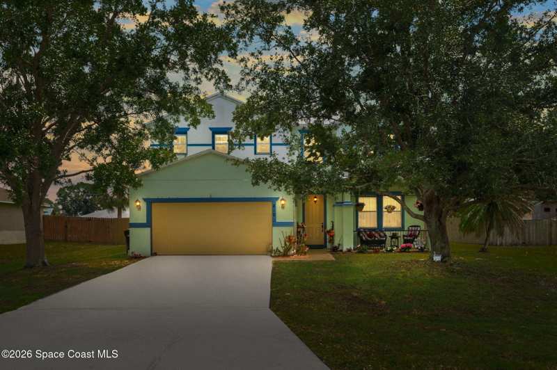 4 bedroom Single Family Residence at 818 Boeing Street, Port Malabar Unit 8, Palm Bay — photo 1