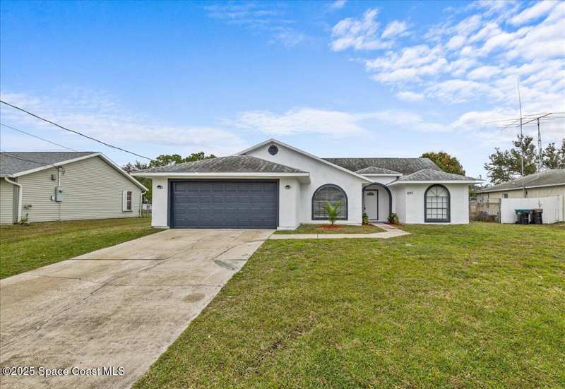 3 bedroom Single Family Residence at 1051 Flower Street, Port Malabar Unit 42, Palm Bay — photo 1