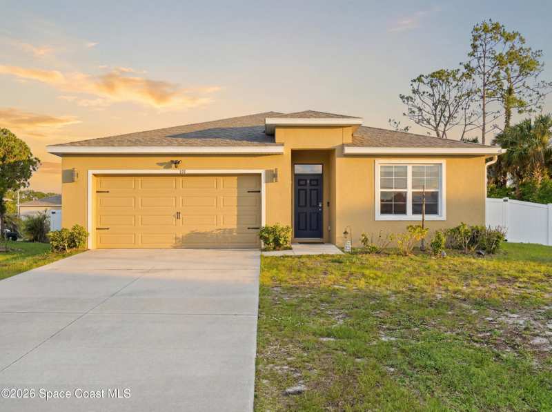 4 bedroom Single Family Residence at 104 Carmelite Avenue, Port Malabar Unit 14, Palm Bay — photo 1